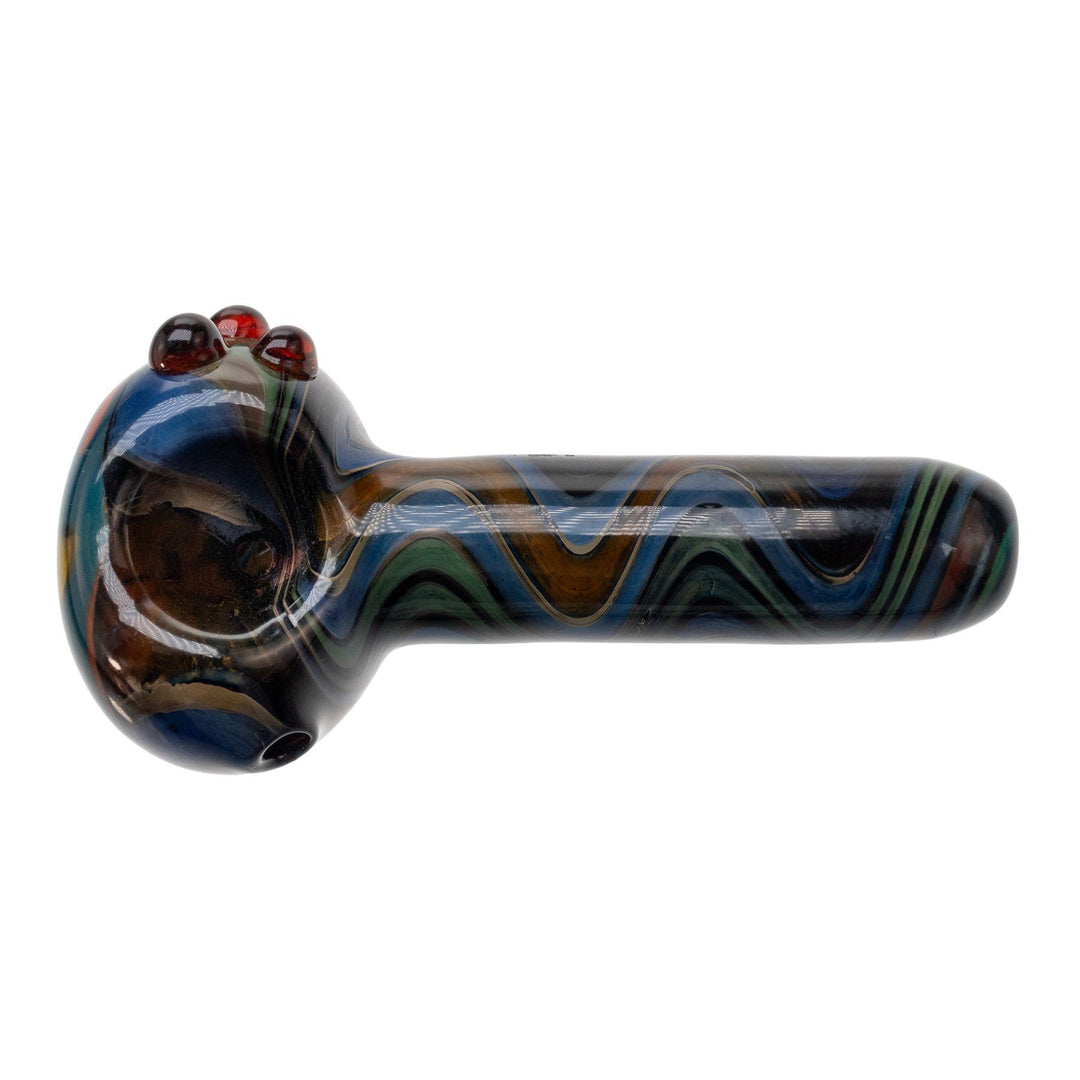 "Top-down view of a Pulsar Into a Waking Dream hand pipe on a white background," - Up N Smoke.