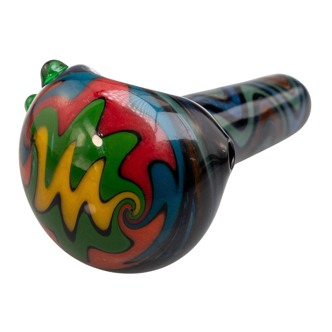 "Close-up of the front of a Into a Waking Dream Pulsar hand pipe on a white background," - Up N Smoke.