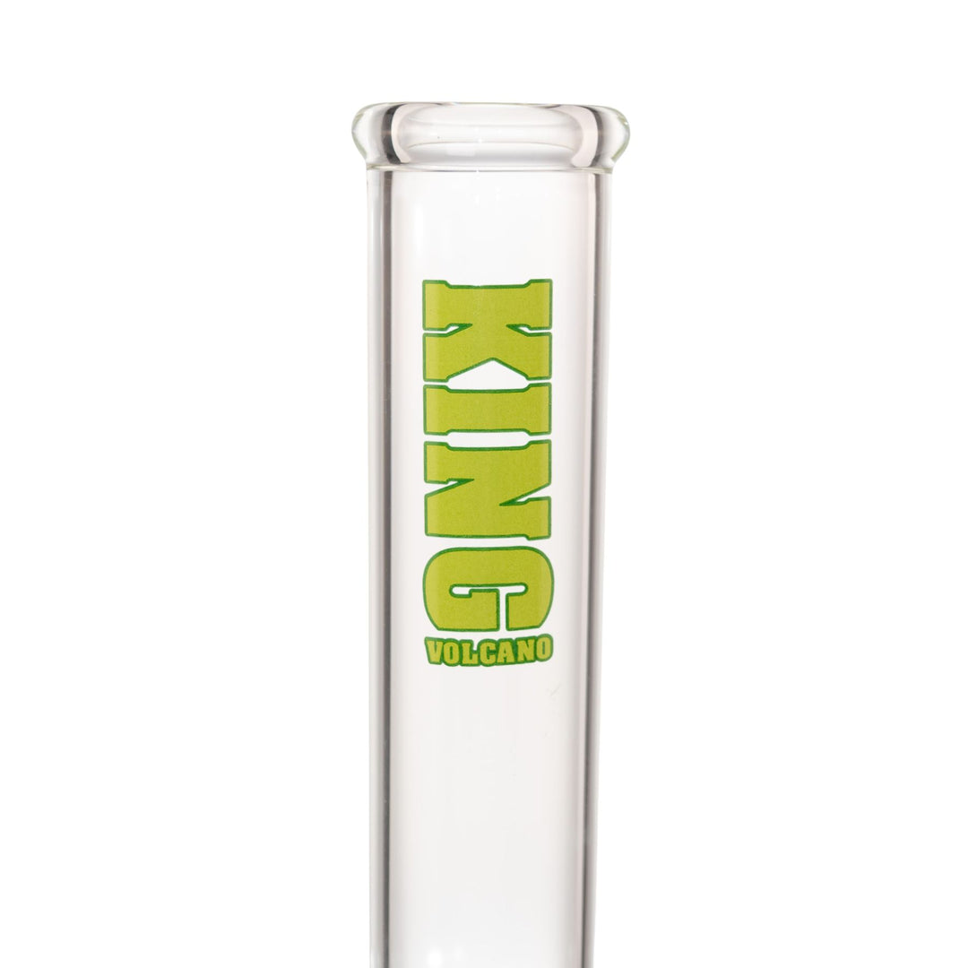 "Close-up view of the green King Volcano logo near the mouthpiece of a 50mmx15in Beaker," - Up N Smoke.