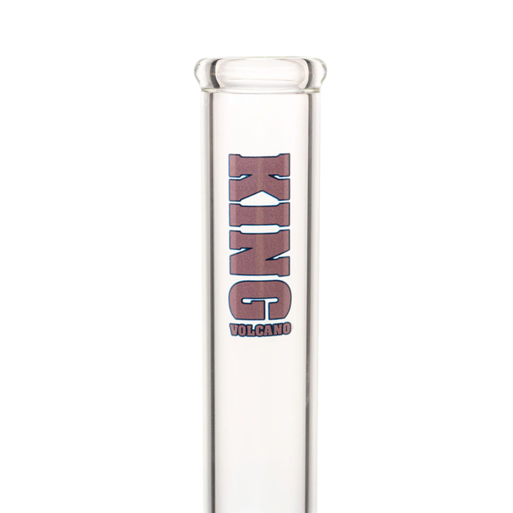 "Close-up view of a purple King Volcano logo near the mouthpiece of a 50mmx15in Beaker," - Up N Smoke.