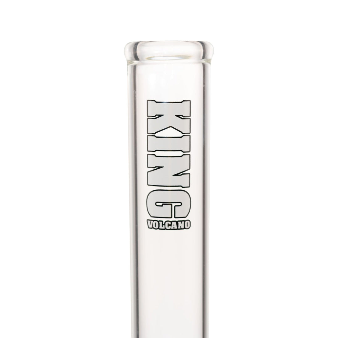 "Close-up view of the white King Volcano logo near the mouthpiece of a 50mmx15in Beaker," - Up N Smoke.