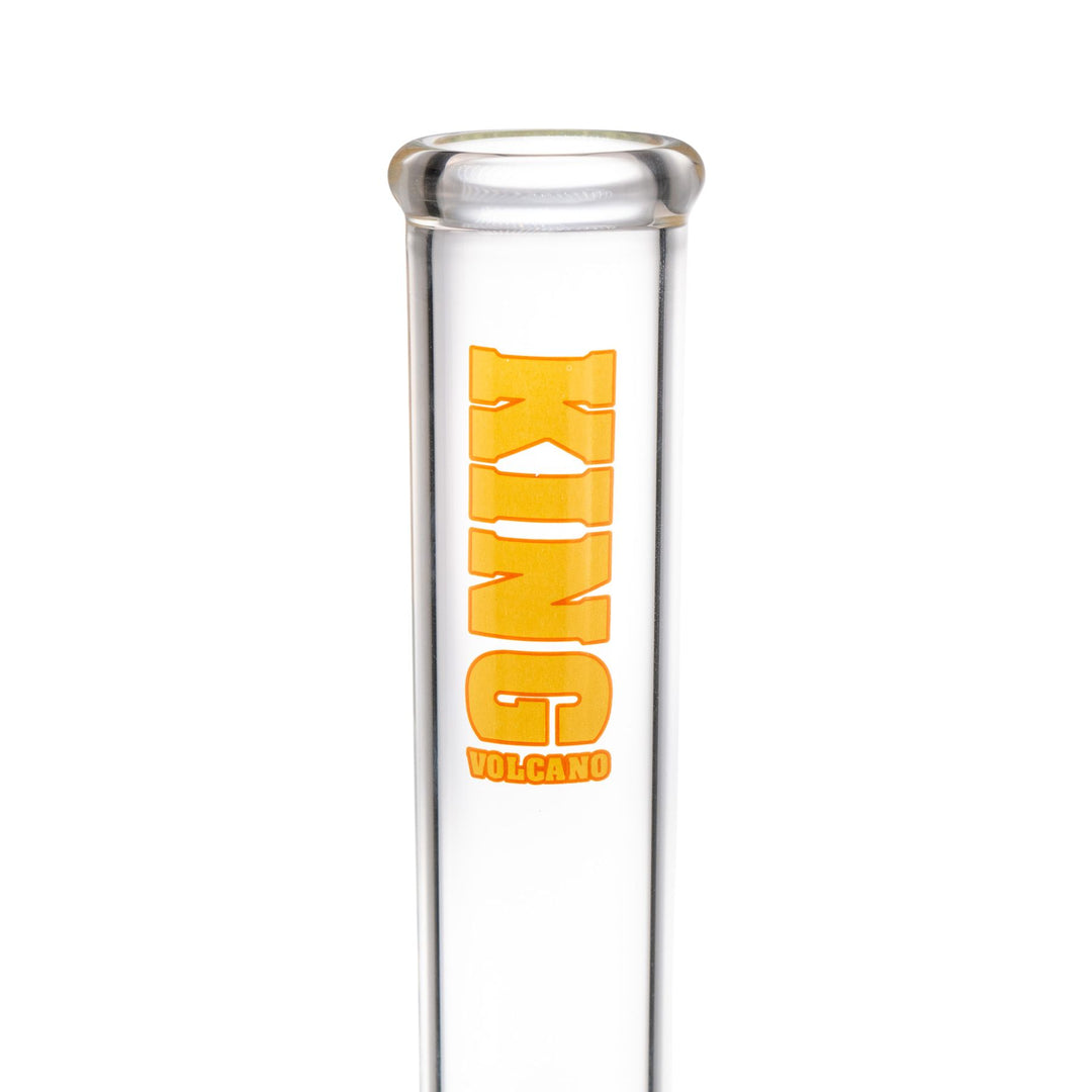 "Close-up of a yellow logo on a King Volcano 50mmx20'' Double Beaker," - Up N Smoke.