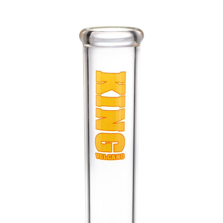 "Close-up of a yellow logo on a King Volcano 50mmx20'' Double Beaker," - Up N Smoke.