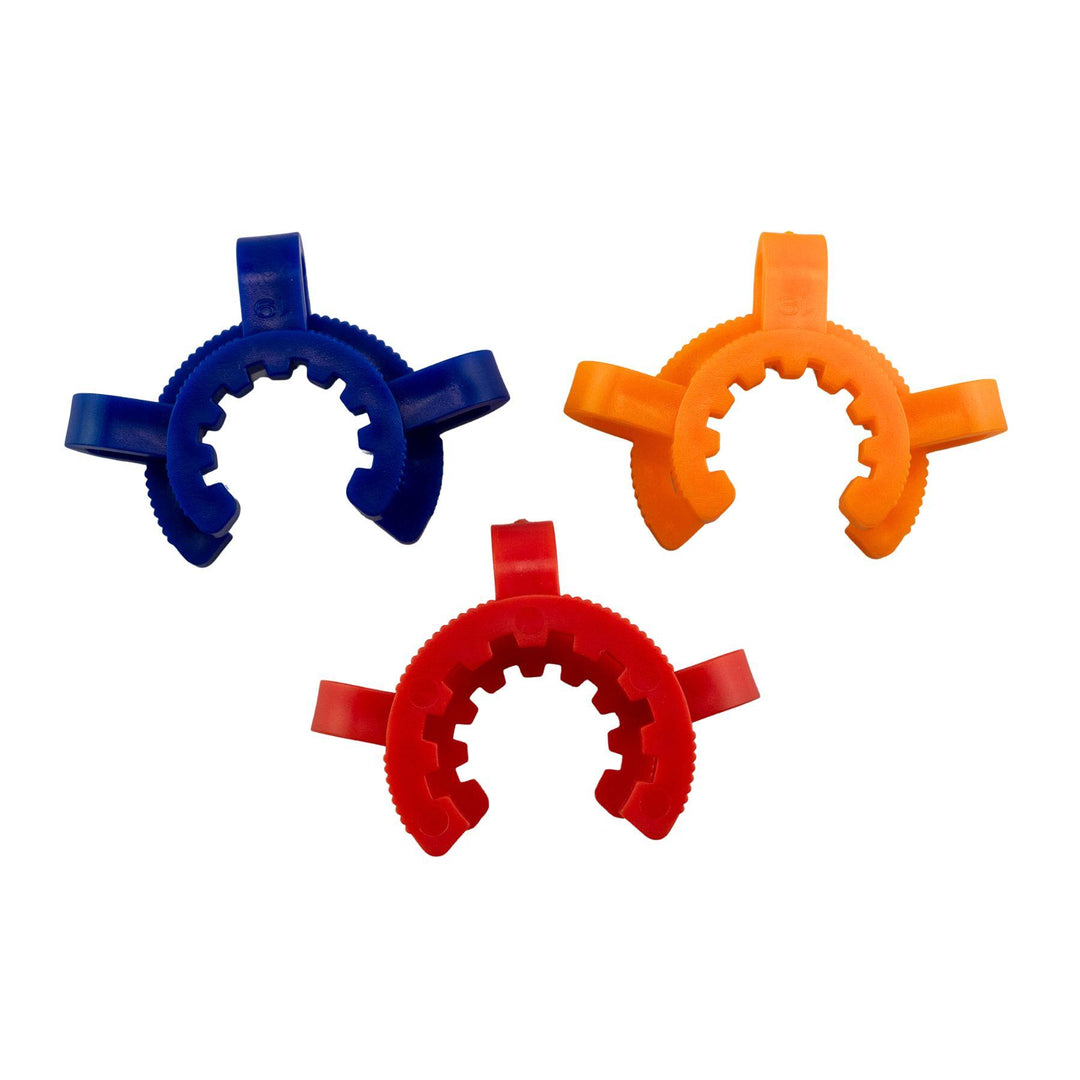 "Three colorful plastic clips (blue, orange, and red) on a white background," - Up N Smoke.