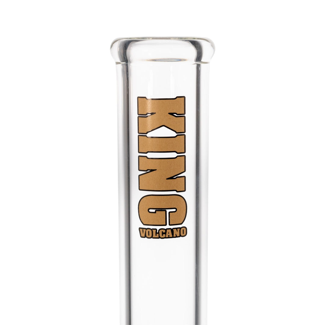 "Close-up of a King Volcano gold logo that is near the mouthpiece of a 50mmx14in beaker," - Up N Smoke.
