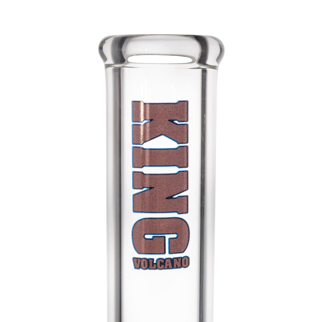 "Close-up of the purple branding on a King Volcano 50mmx14'' Beaker. This piece features a three-prong ice pinch and a diffused downstem," - Up N Smoke.