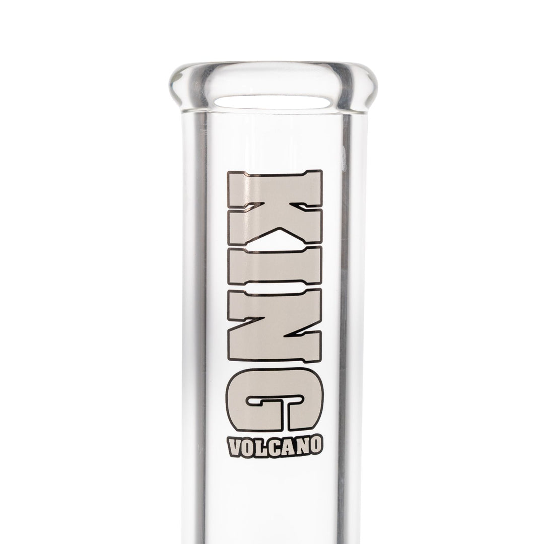 "Close-up of a white 'King Volcano' logo wrapped around the mouthpiece of a 50mmx14'' beaker," - Up N Smoke.