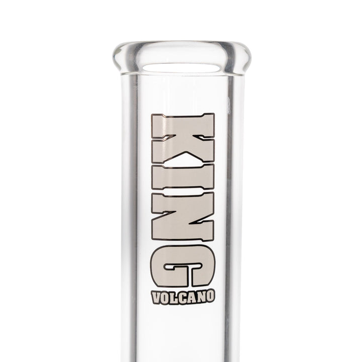 "Close-up of a white 'King Volcano' logo wrapped around the mouthpiece of a 50mmx14'' beaker," - Up N Smoke.