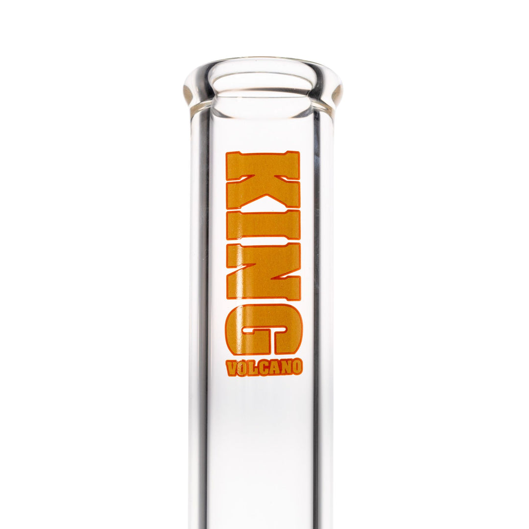 "Close-up of a red and yellow King Volcano logo near the top of the mouthpiece," - Up N Smoke.