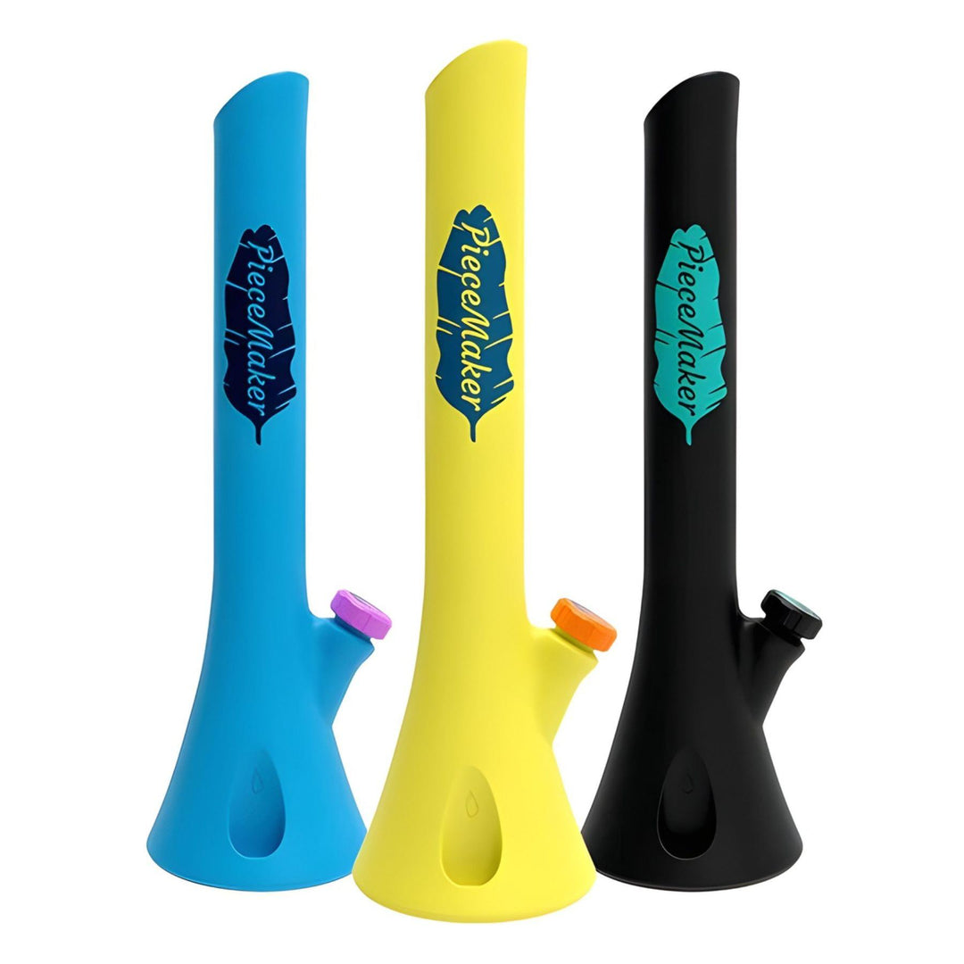 "Three Kirby PieceMaker Silicone Water Pipes in the colors blue, yellow, and black," - Up N Smoke.
