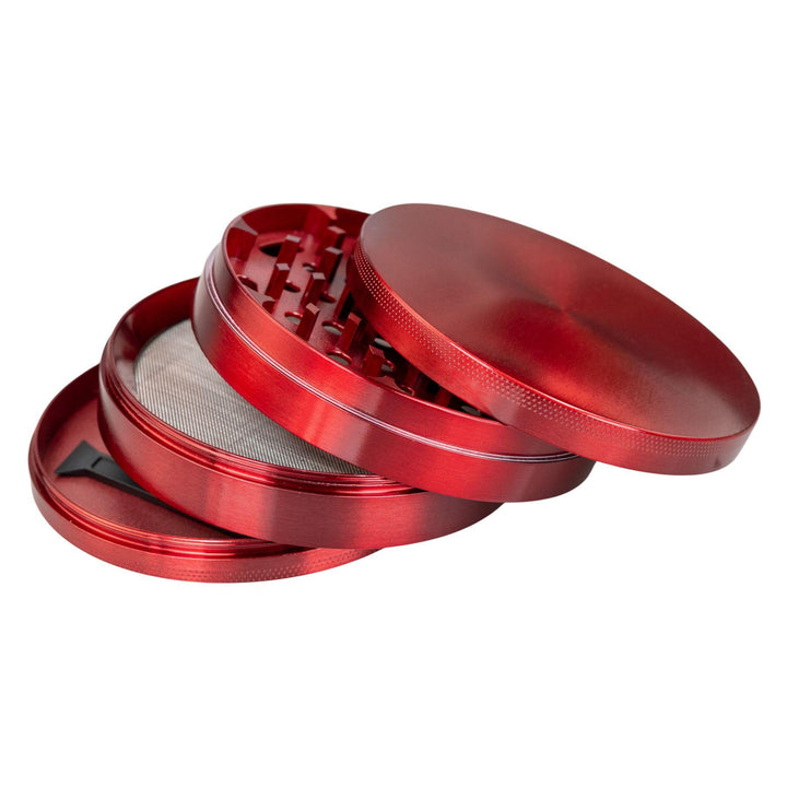 "Large Red 4-Piece Grinder with its compartments splayed out and stacked on top of one another," - Up N Smoke.