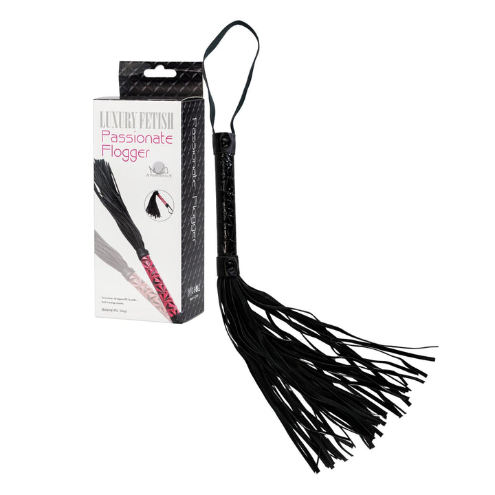 Leather Flogger Whip displayed on a white background with the product and packaging - Up N Smoke