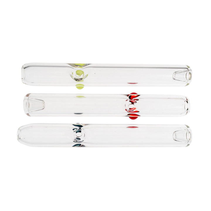 "Three Merican Glass Steamrollers in the variations Slyme, Red, and Blue, on a white background," - Up N Smoke.