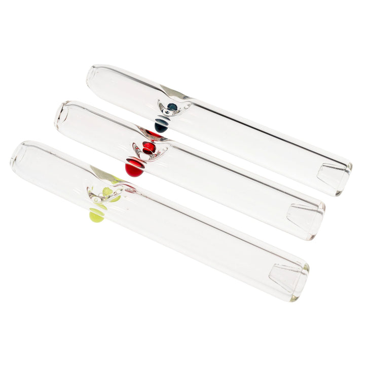 "Group of three Merican Glass Steamrollers in the variations Slyme, Red, and Blue, on a white background," - Up N Smoke.