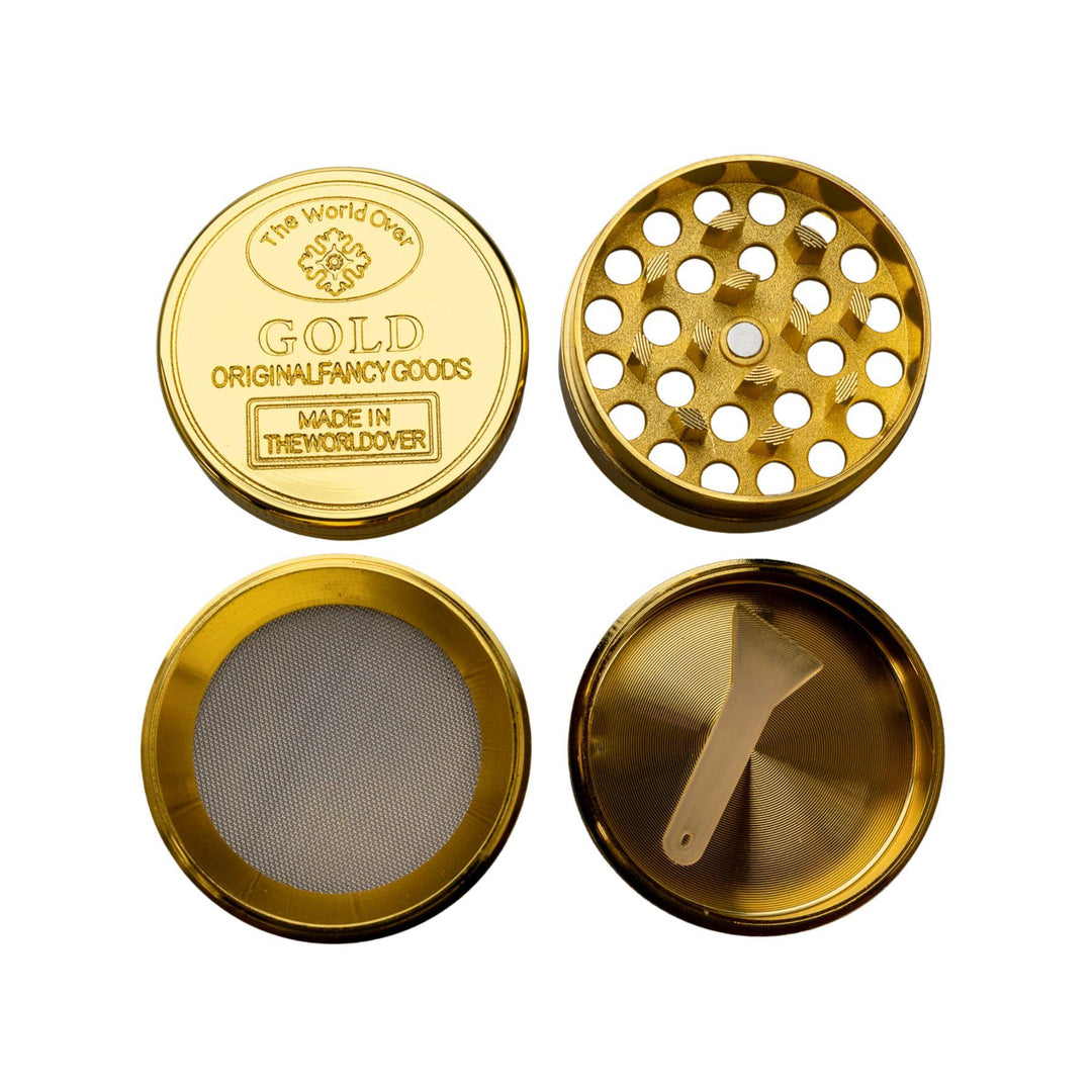 "Four-Piece Mini Gold Grinder with all four compartments laid out, showcasing the tool's details on a white background," - Up N Smoke.