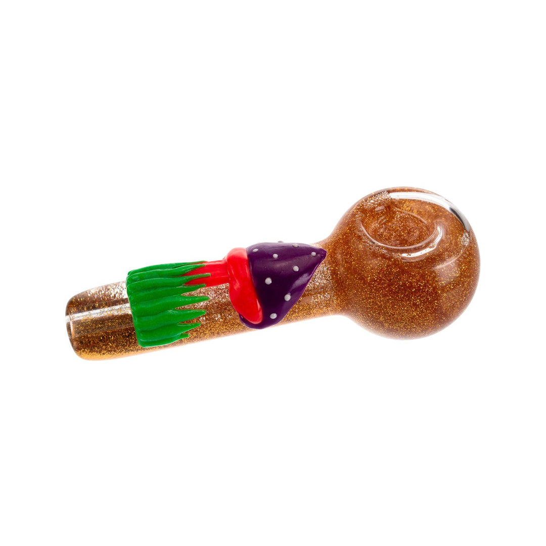 "5-inch gold glitter glycerin hand pipe with a UV and black light-reactive mushroom on the handle, designed for freezing to provide smoother hits, with a front carb for easy control." - Up N Smoke.