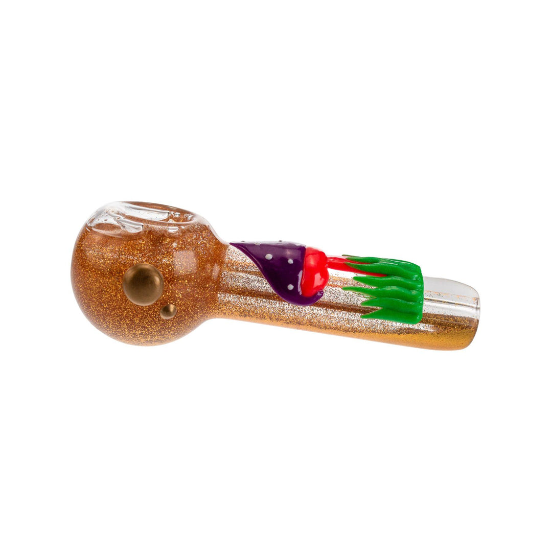 "5-inch gold glitter glycerin hand pipe with a UV and black light-reactive mushroom on the handle, designed for freezing to provide smoother hits, with a front carb for easy control." - Up N Smoke.