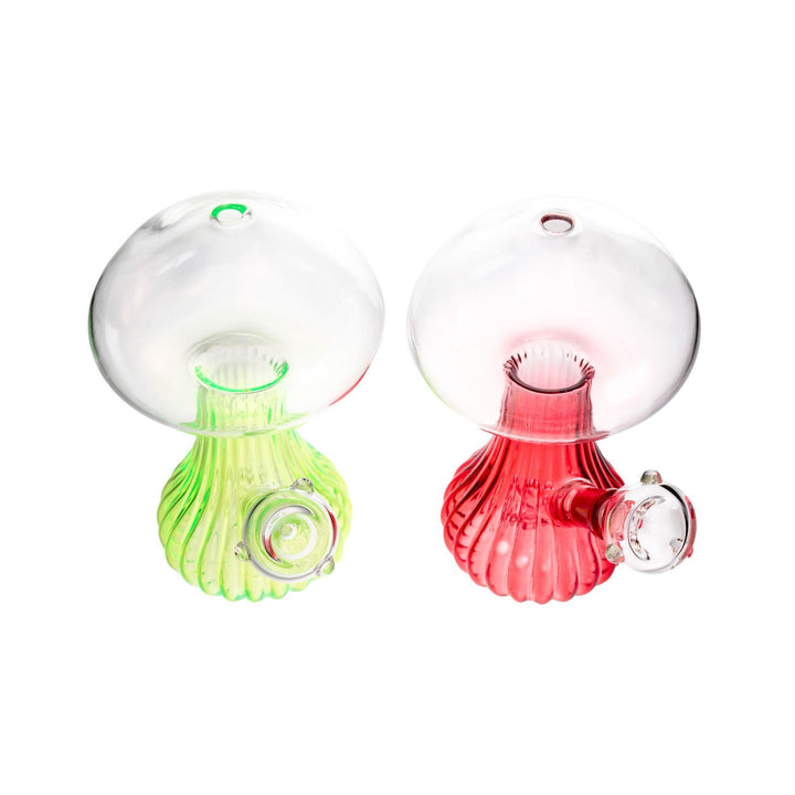 "7-inch clear glass water pipe with a vibrant mushroom design, neon base, fixed diffuser downstem, and 14mm male herb slide. Available in red and green." – Up N Smoke