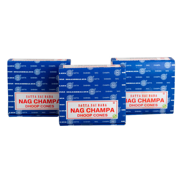 Three boxes of Nag Champa dhoop cones on a white background