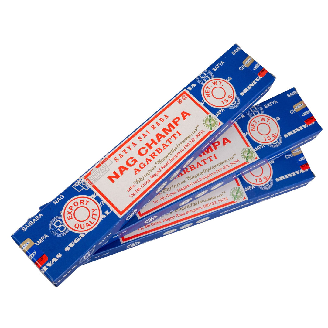 Three packages of Nag Champa incense sticks on a white background - Up N Smoke