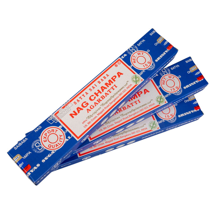 Three packages of Nag Champa incense sticks on a white background - Up N Smoke