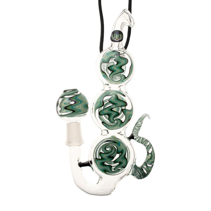 "Triple Disc Pendant Pipe that has wig-wag patterns throughout the bodice and bowl on a white background," - Up N Smoke.