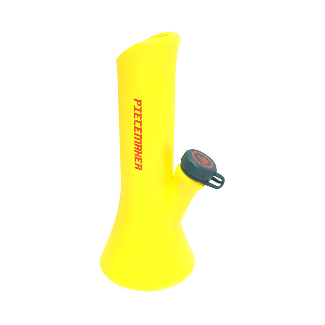 "Yellow Kali Go PieceMaker Water Pipe that is made out of silicone on a white background," - Up N Smoke.