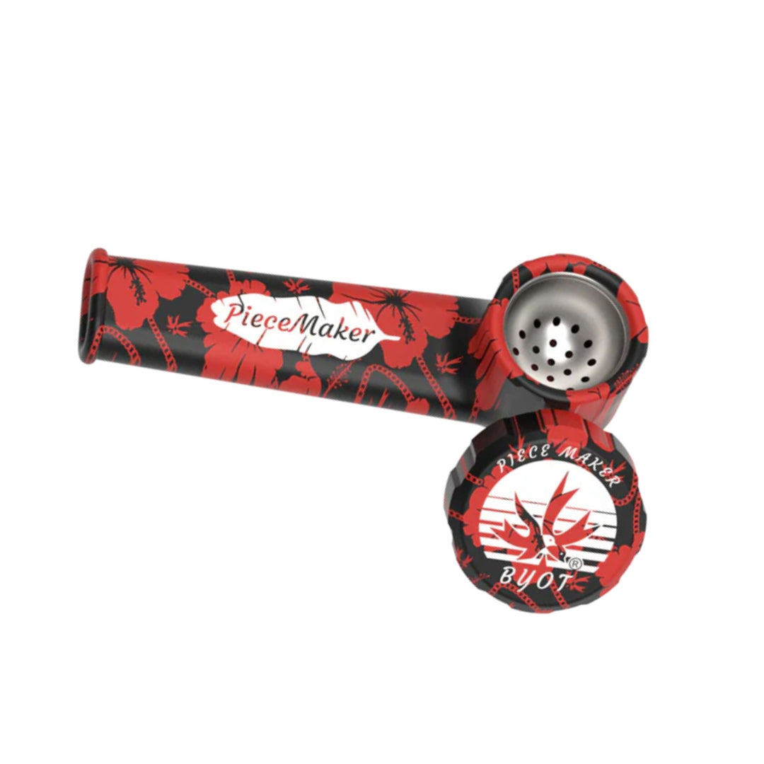 "A red and black PieceMaker Karma Silicone Pipe that comes with a bowl saver cap and features a removable stainless steel bowl," - Up N Smoke.