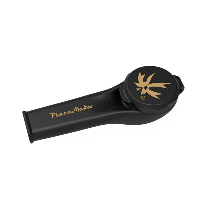 "A black and gold Karma Kayo Piecemaker made out of silicone and featuring a tethered cap," - Up N Smoke.