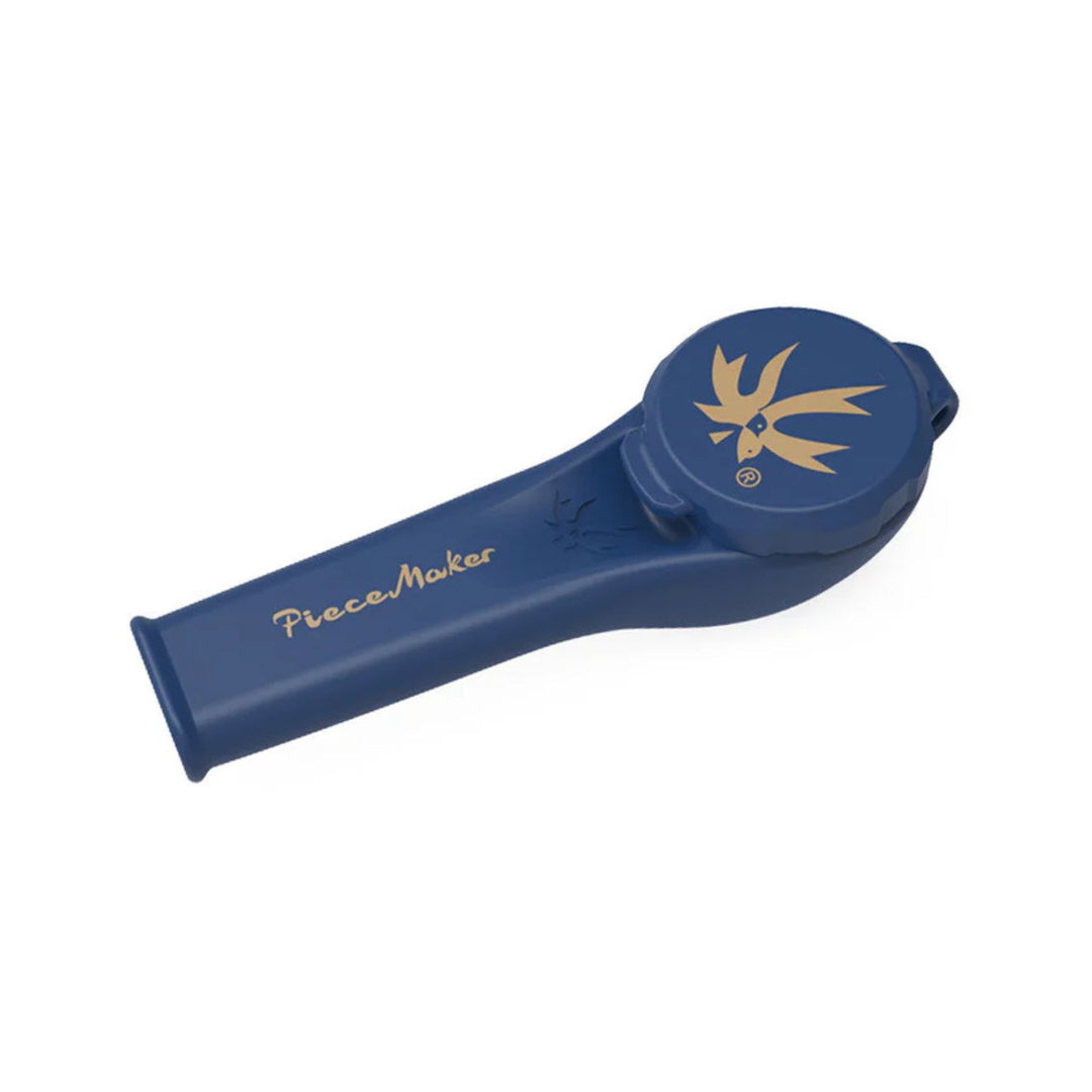 "A blue and gold Piecemaker Karma Kayo Silicone Pipe that features a tethered cap and a borosilicate glass bowl," - Up N Smoke.
