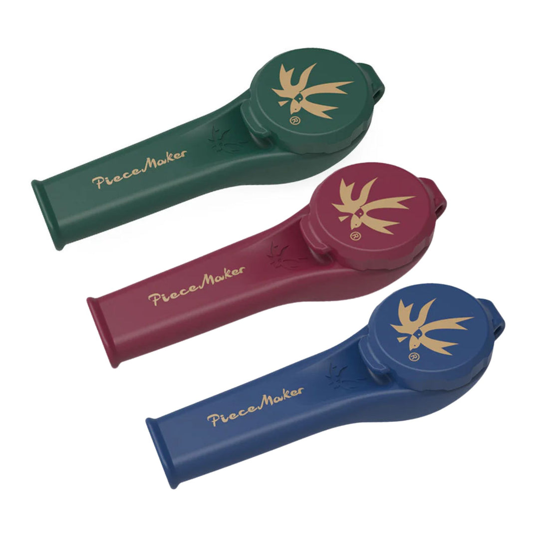 "Group of three Karma Kayo Piecemaker hand pipes made out of silicone in the colors green, red, and blue," - Up N Smoke. 