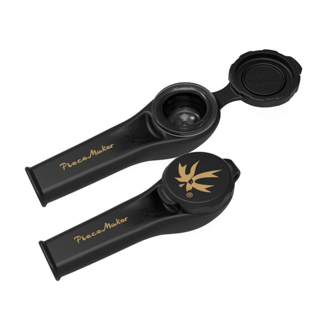 "Two black Karma Kayo Piecemaker Silicone Pipes. One is open to showcase its tethered cap and borosilicate glass bowl," - Up N Smoke.