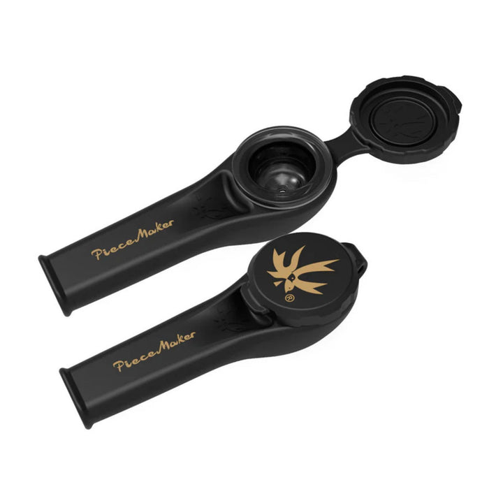 "Two black Karma Kayo Piecemaker Silicone Pipes. One is open to showcase its tethered cap and borosilicate glass bowl," - Up N Smoke.
