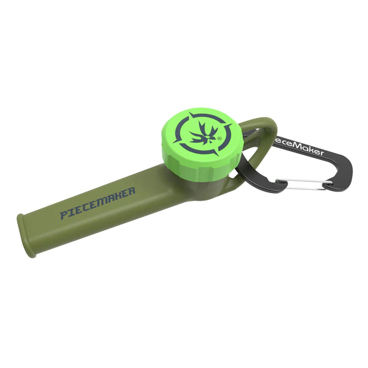 "An olive-colored Silicone 'Karma Go!' Piecemaker Pipe that comes with a carabiner and a bowl cap," - Up N Smoke.