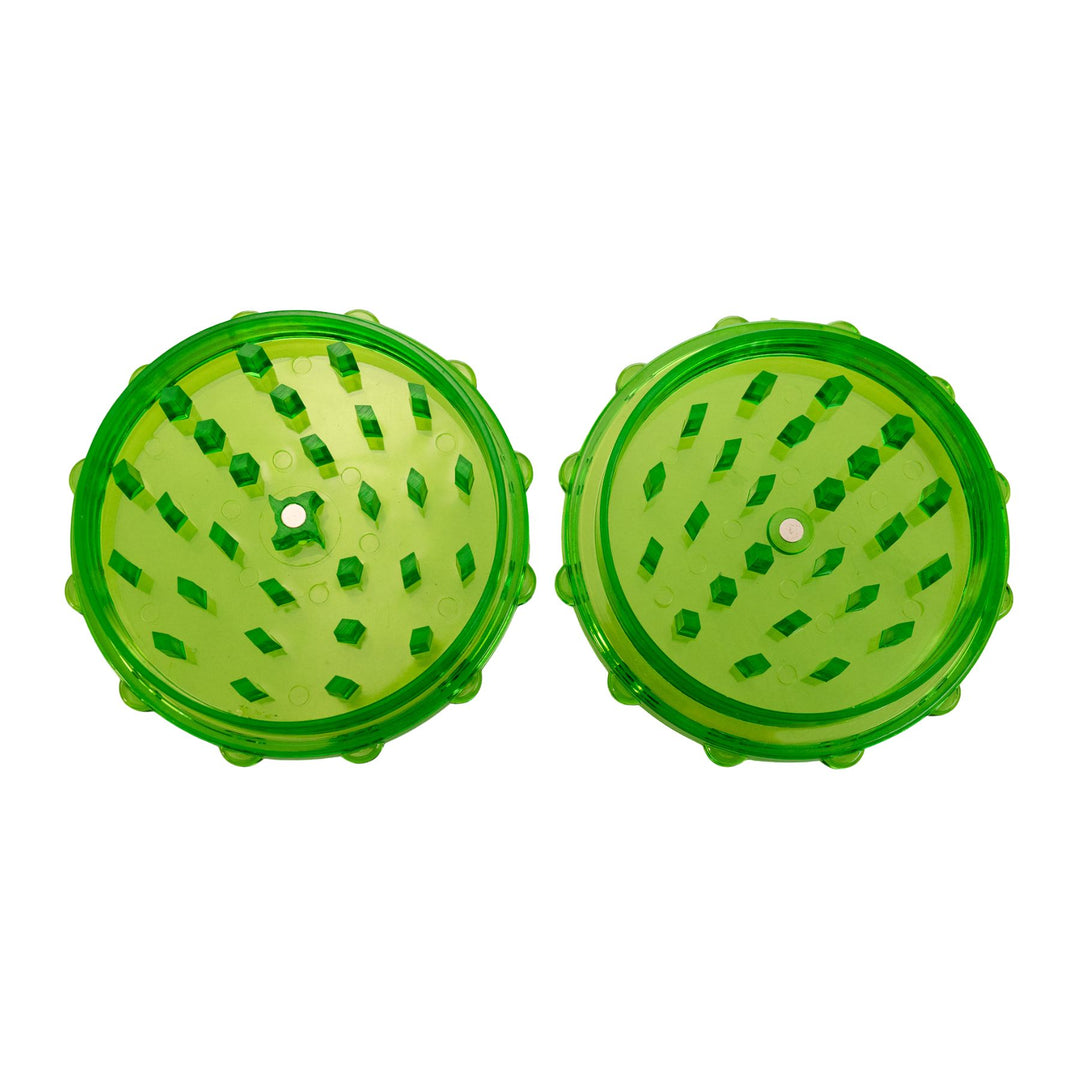 "Open green plastic grinder showing both parts of this two-piece tool," - Down to Earth.