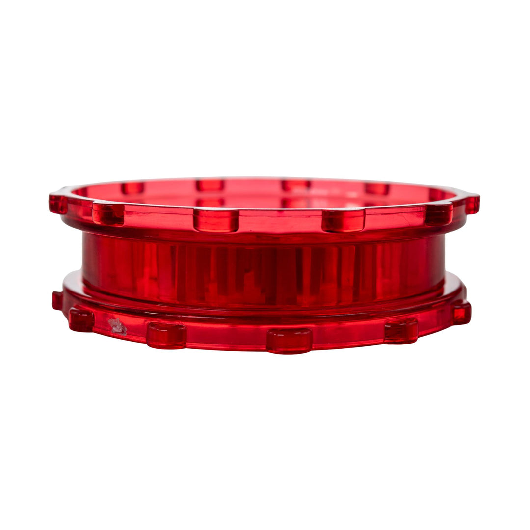 "Plastic 2-piece grinder in the color red on a white background," - Up N Smoke.