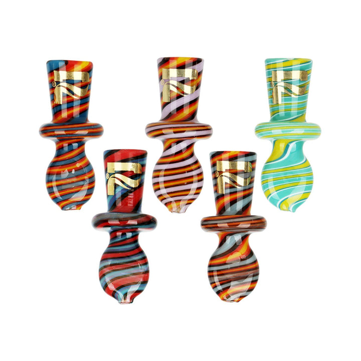 "Set of five colorful cone holders made by Pulsar on a white background. These items are used to hold a cone easier," - Up N Smoke. 