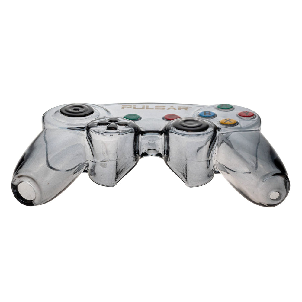 "Side angle of a Pulsar Game Controller Hand Pipe laying flat on a white background," - Up N Smoke.
