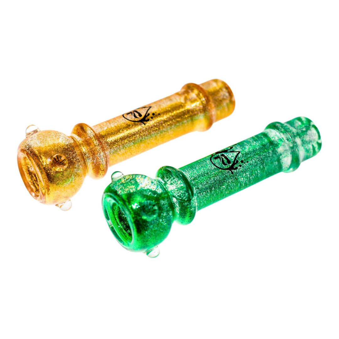 "Two Pulsar glycerin glitter chillums, one in shimmering gold and the other in glittering green. Both chillums feature a compact, cylindrical design with a black Pulsar logo. The glycerin-filled interior enhances the glitter effect, making these chillums visually striking. Perfect for a smooth, cool smoking experience." - Up N Smoke.