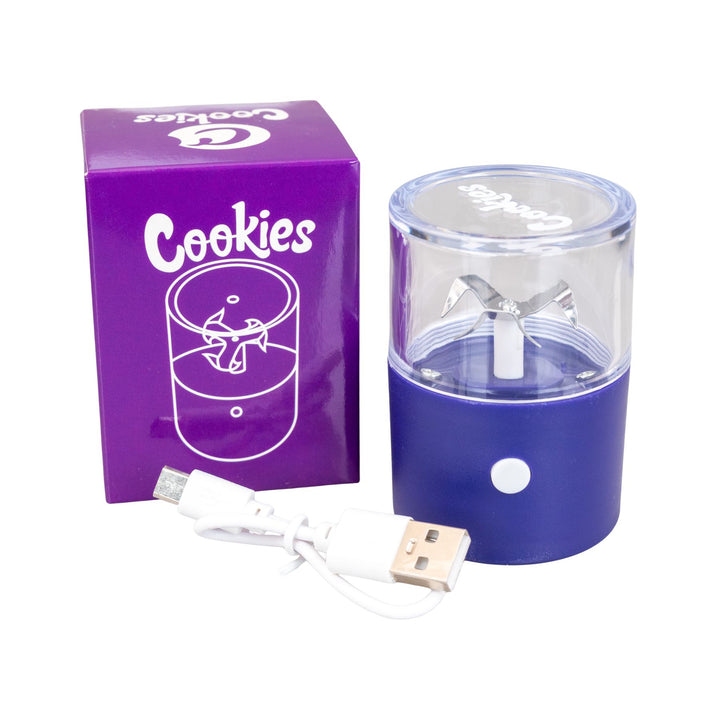 "Purple Cookies Electric Grinder in front of the box it comes in and next to the included micro USB charging cable," - Up N Smoke.