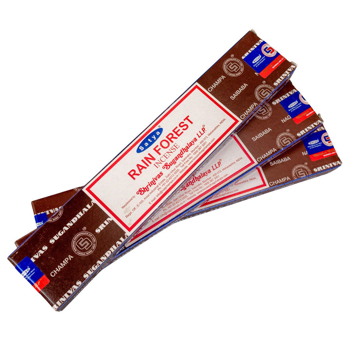 Stack of Satya Rain Forest incense sticks on a white background - Up N Smoke