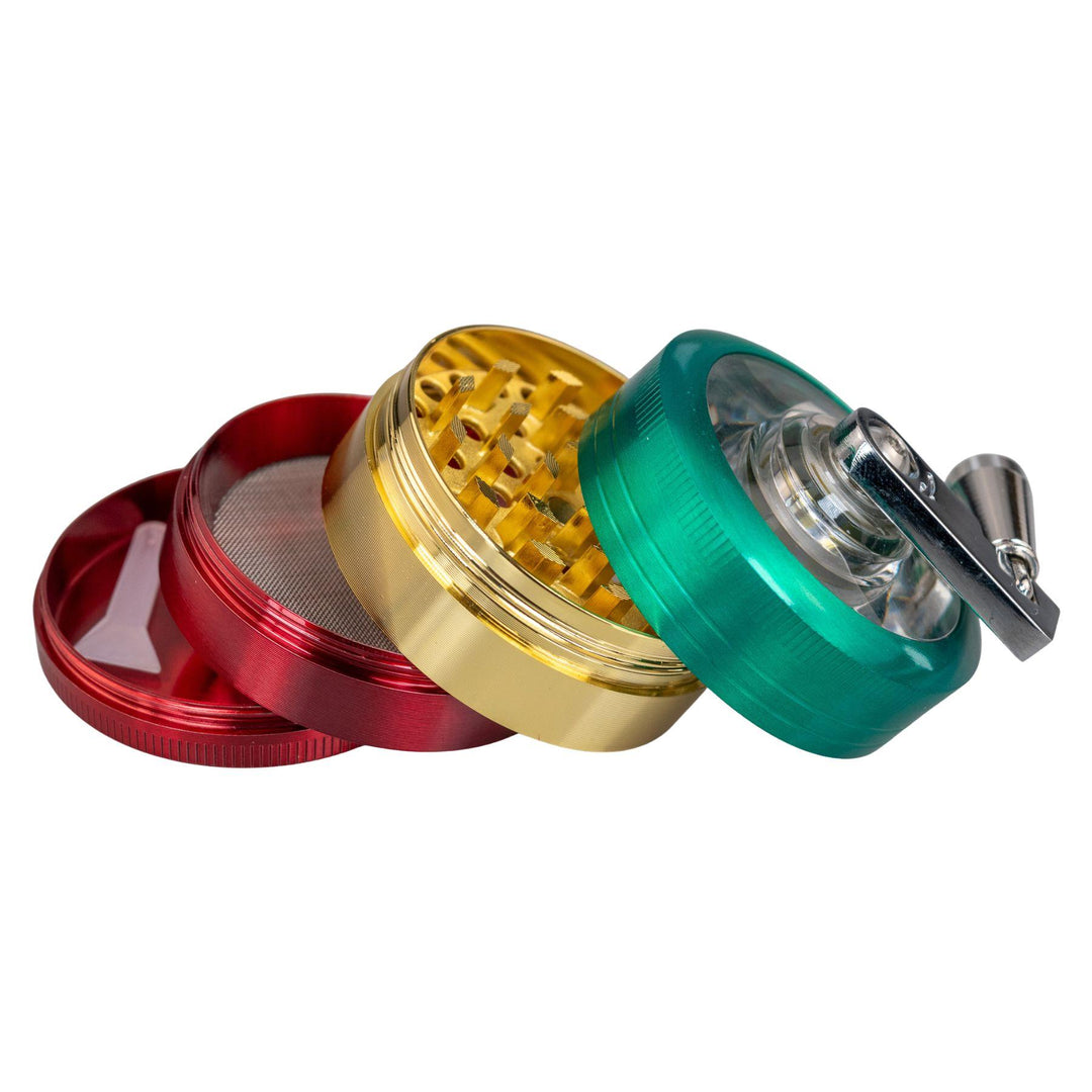 "Rasta Lever Grinder with all four compartments splayed out and stacked on top of one another," - Up N Smoke.