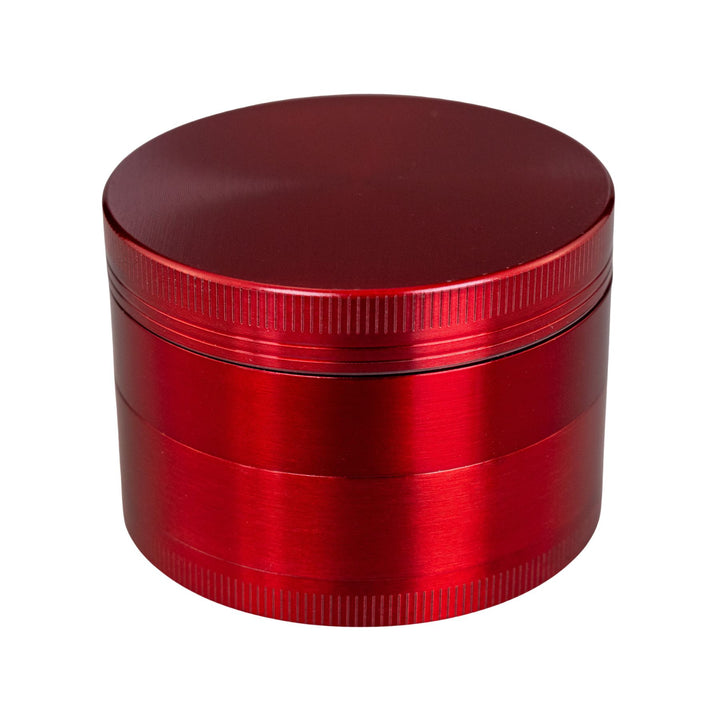 "Red Classic 4-Piece Grinder on a white background," - Up N Smoke.