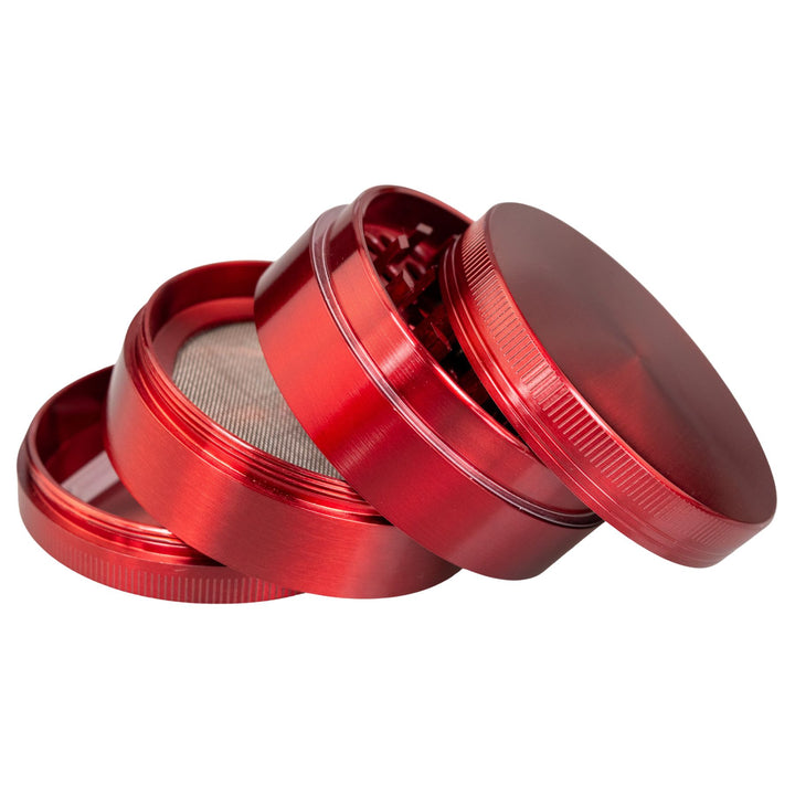 "Red Classic 4-Piece Grinder with all four compartments separated and stacked upon one another," - Up N Smoke.