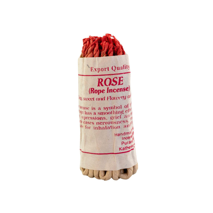 "Rose Rope Incense with red tips on a white background," - Up N Smoke.