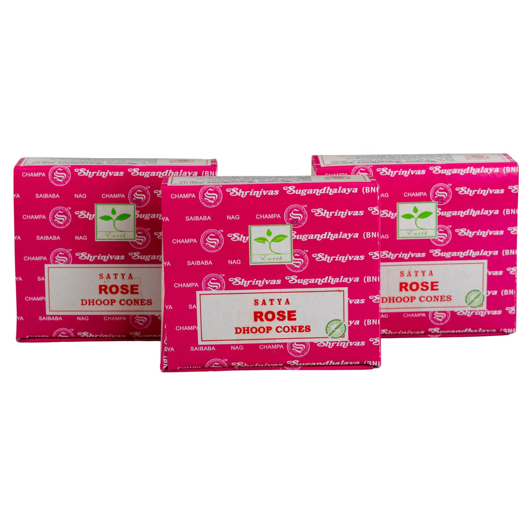 Three boxes of Satya Rose Dhoop Cones on a white background
