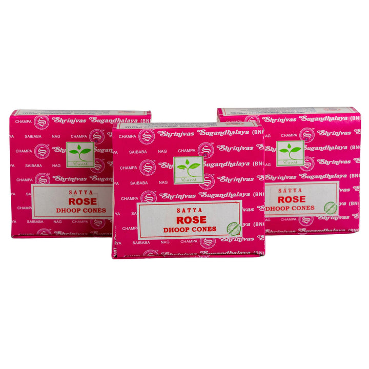 Three boxes of Satya Rose Dhoop Cones on a white background