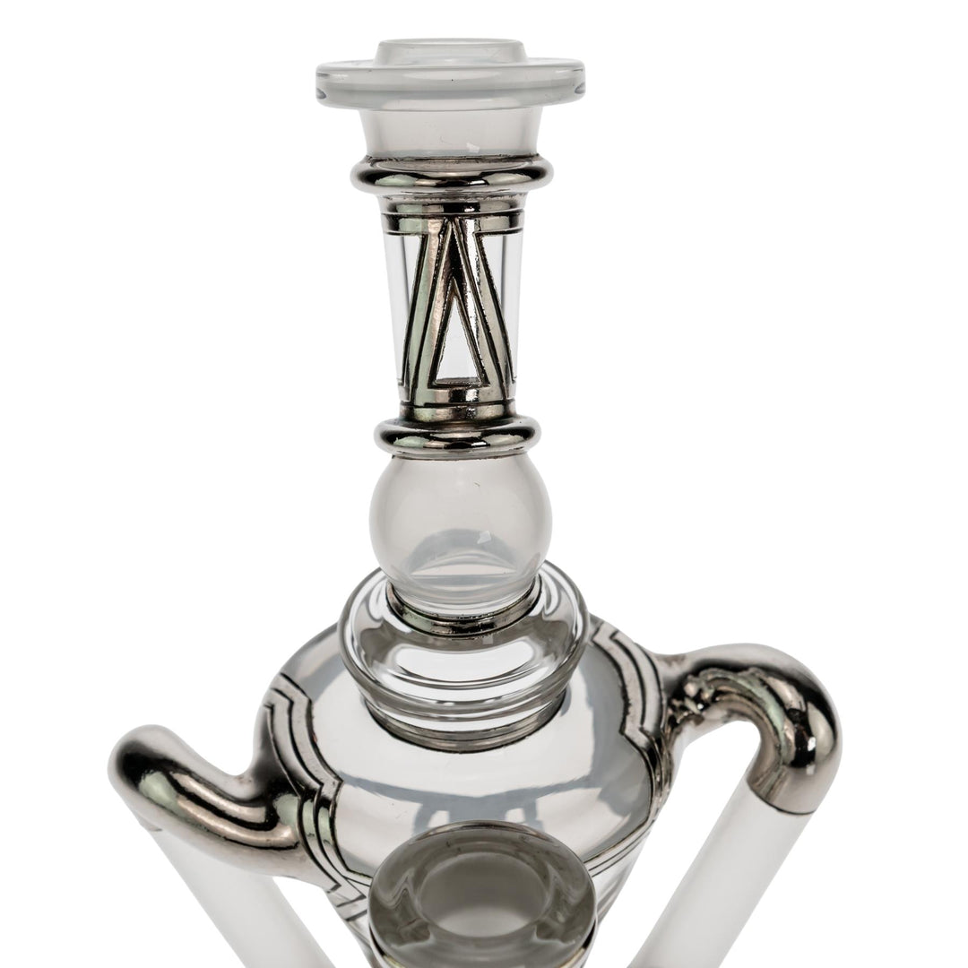 "Mouthpiece of a Ryan Fitt Klein Recycler on a white background," - Up N Smoke.