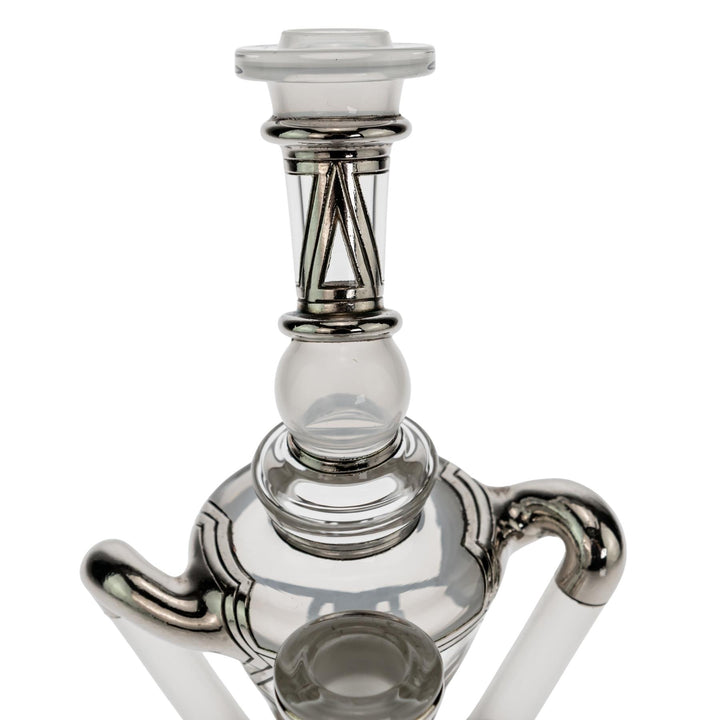 "Mouthpiece of a Ryan Fitt Klein Recycler on a white background," - Up N Smoke.
