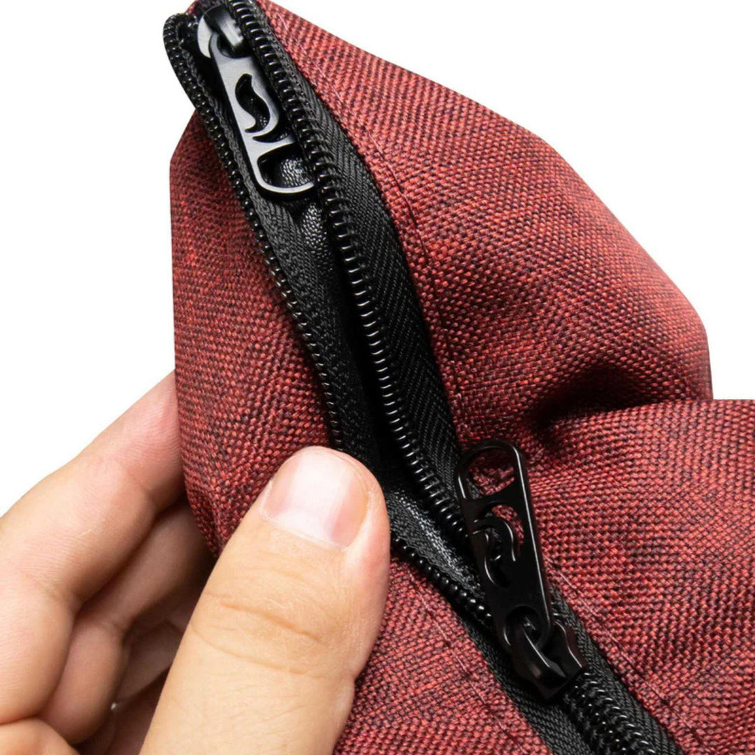 "Zipper closure of a SK9 Zipper Tube Smell-Proof Bag on a white background," - Up N Smoke.